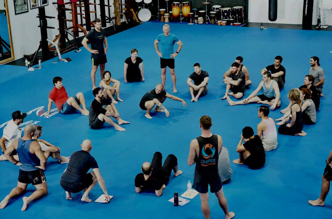 Group training session with a presenter in front of a small team