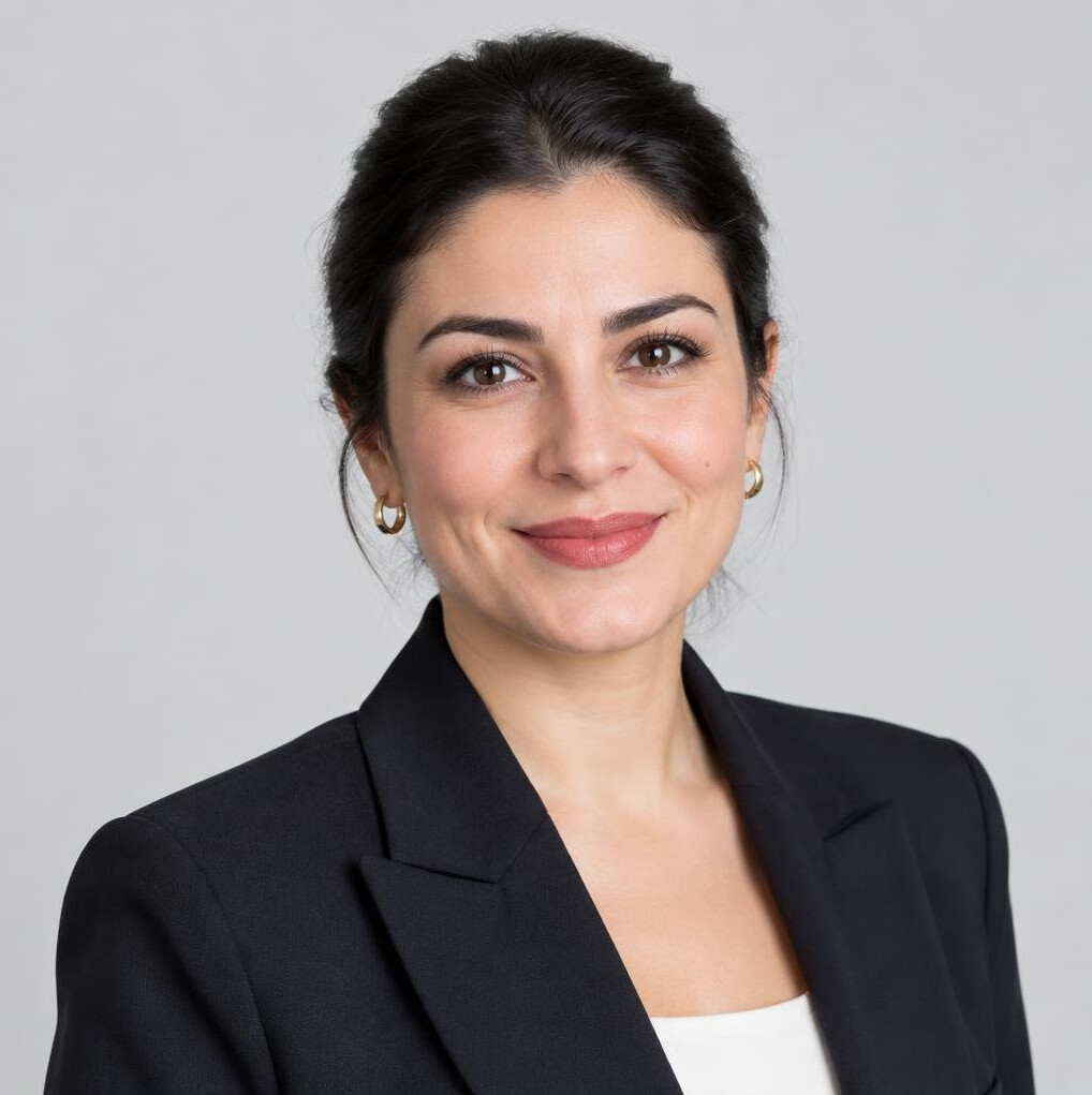 Portrait of a Turkish woman in her 30s wearing business attire